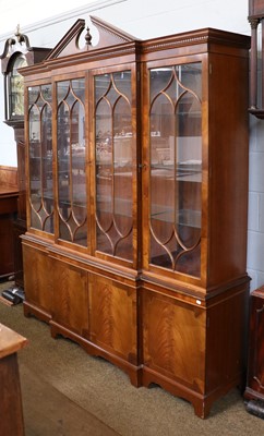 Lot 1403 - A Reproduction Mahogany Breakfront Bookcase,...