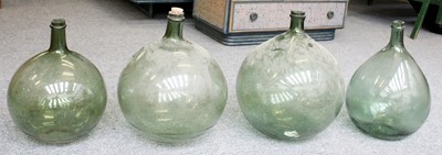 Lot 463 - Four Green Glass Carbouys, largest approx 44cm