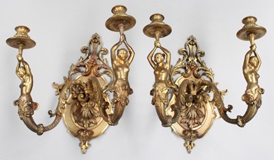 Lot 211 - A Pair of Gilt Bronze Twin-Light Wall Sconces,...