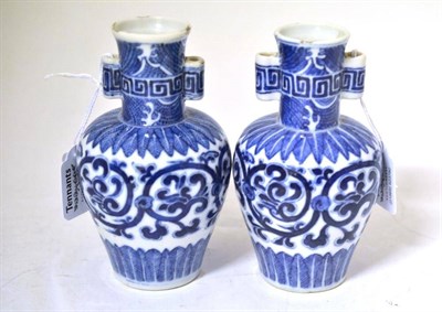 Lot 185 - A Pair of Chinese Blue and White Porcelain Arrow Vases, bearing Qianlong seal marks but 19th...