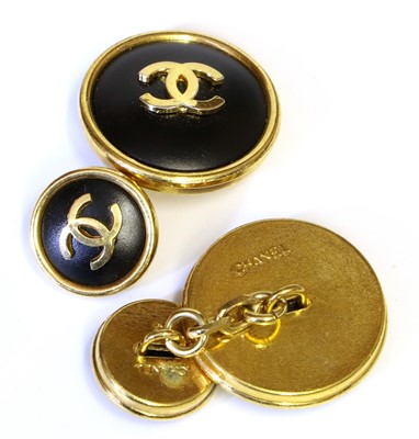 Lot 2119 - A Pair of Chanel Cufflinks, the circular matte...