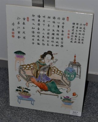 Lot 357 - A Chinese porcelain plaque painted with a figure beneath Chinese characters, Daoguang period,...
