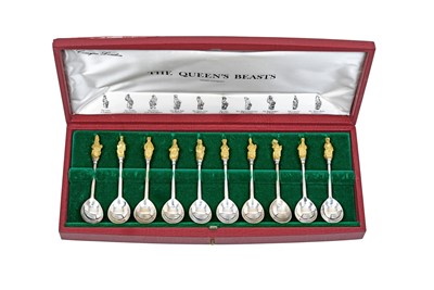 Lot 2119 - A Cased Set of Ten Elizabeth II Parcel-Gilt Silver Queen's Beast Spoons