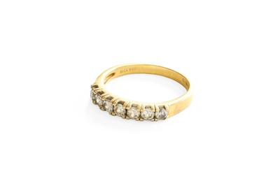 Lot 216 - An 18 Carat Gold Diamond Seven Stone Ring, the...