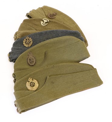 Lot 132 - Four Second World War Khaki Field Service Caps,...