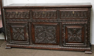 Lot 1283 - An Ornatley Carved Oak Sideboard, decortating...