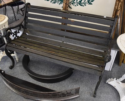 Lot 1476 - A Victorian wooden slatted garden bench with...