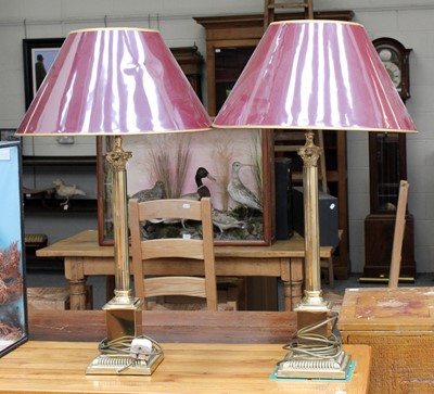 Lot 1448 - Pair of Brass Based Corithian Column Lamps,...