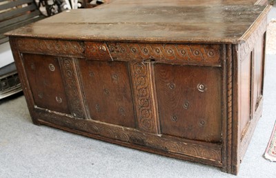 Lot 1190 - A 17th-century Carved Oak Three Panel Coffer,...