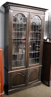 Lot 1290 - An Oak and Leaded Glazed Bookcase, 104cm by...