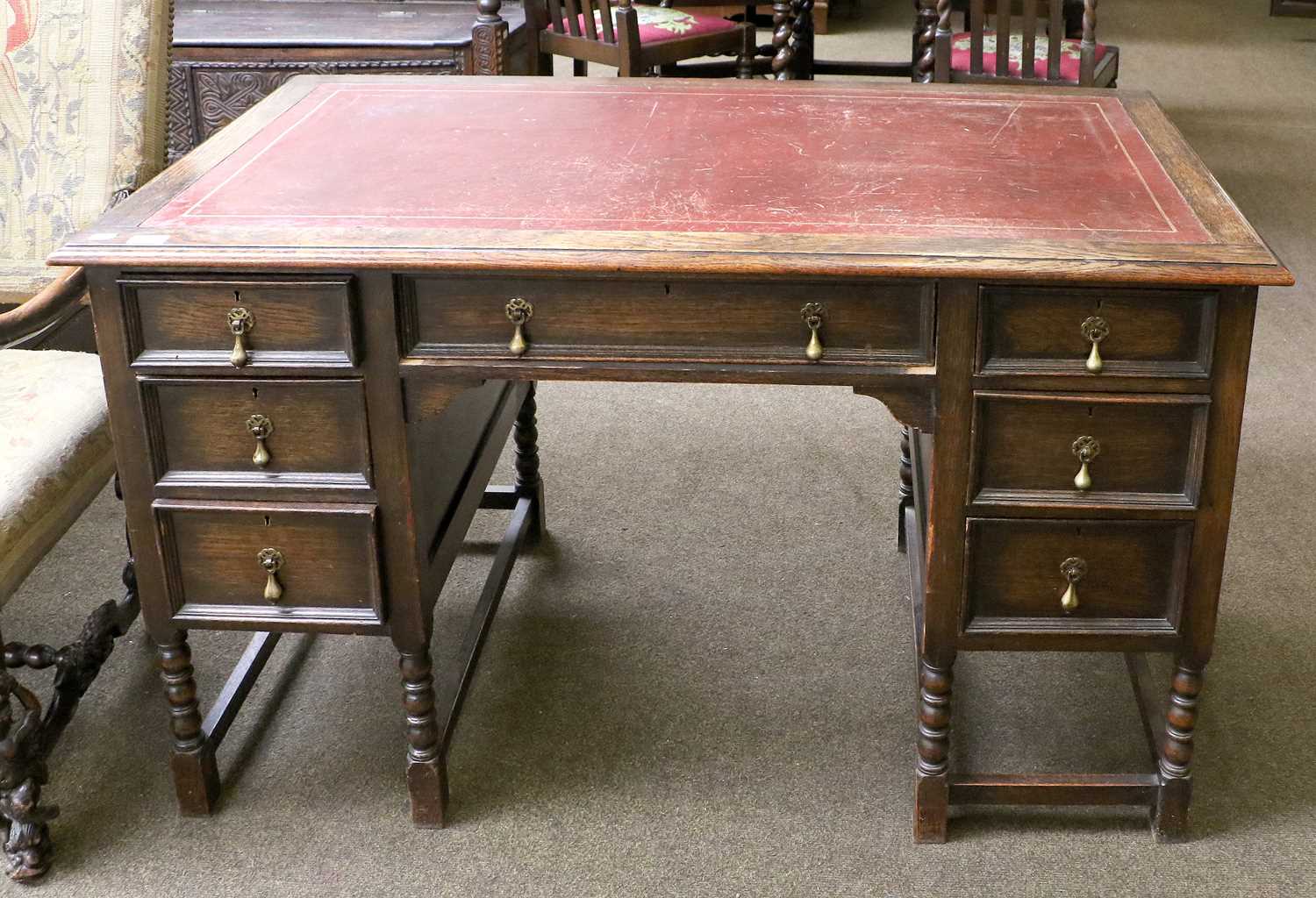 Lot 1317 - A 1920s Red Leather Inset Desk, 125cm by 68cm...