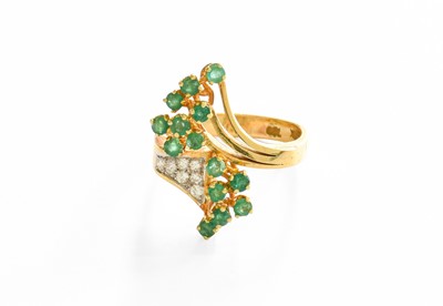 Lot 268 - An Emerald and Diamond Ring, of spray form,...