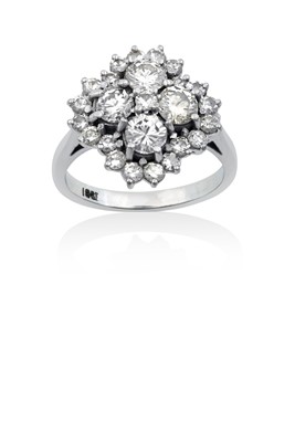 Lot 2121 - A Diamond Cluster Ring a cluster of four round...