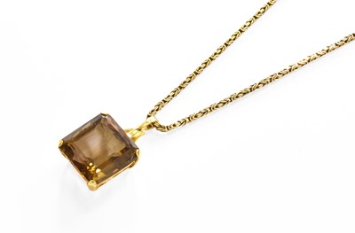 Lot 250 - An 18 Carat Gold Smoky Quartz Pendant on Chain,...