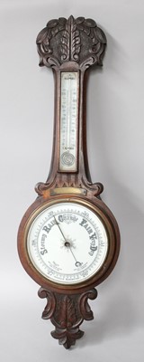 Lot 1109 - A Victorian Aneroid Barometer/Thermometer, in...