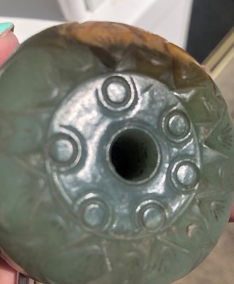 Lot 126 - A Chinese Jade Disc, carved with a mythical...