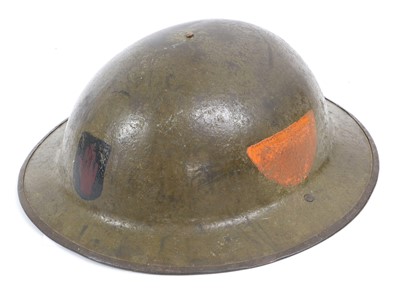 Lot 166 - A First World War Mark I Brodie Combat Helmet,...