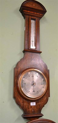 Lot 456 - An inlaid aneroid barometer signed Lancaster and Thorpe, Derby