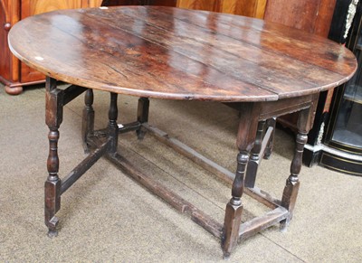 Lot 1471 - An 18th century oak gateleg table, 147cm by...