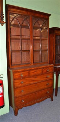 Lot 461 - Regency mahogany six drawer chest with bookcase top