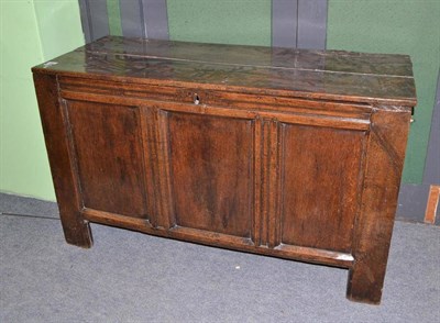 Lot 463 - An 18th century oak three panel coffer