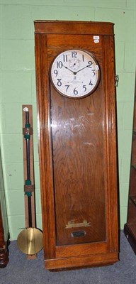 Lot 469 - International time recording clock in an oak case