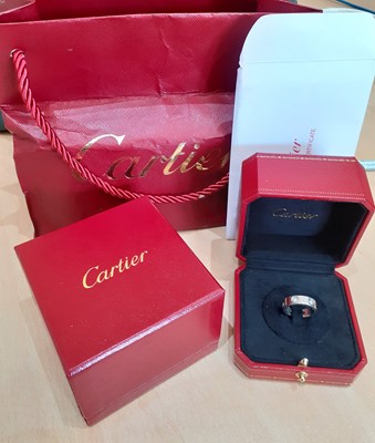 Lot 2299 - A Diamond Set 'Love' Ring, by Cartier the...