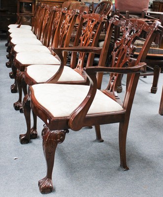 Lot 1130 - A Set of Eight Reproduction Carved Mahogany...