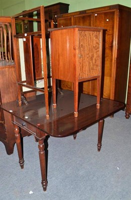 Lot 477 - A mahogany pot cupboard, a mahogany Pembroke table, a towel rail, fire screen and nest of tables