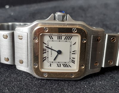 Lot 2163 - Cartier: A Lady's Steel and Gold Wristwatch,...
