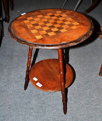 Lot 485 - Victorian tripod chess table