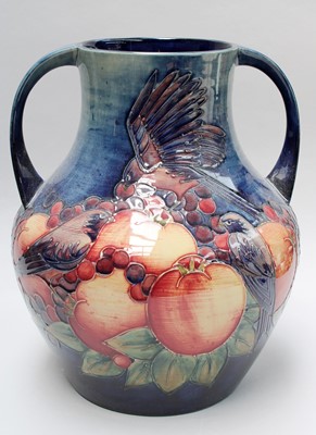 Lot 1 - A Moorcroft Finches on Blue Pattern...