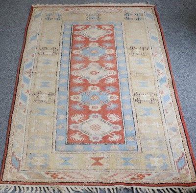 Lot 1103 - A Melas Rug, the pale terracotta field with a...