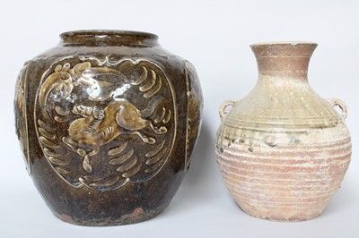 Lot 322 - A Chinese Earthenware Jar, 19th century,...