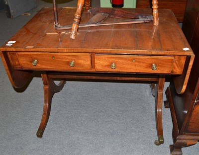 Lot 504 - George III mahogany sofa table with key