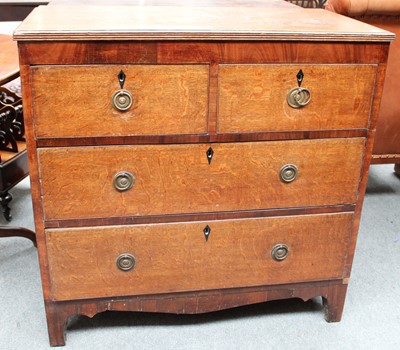 Lot 1166 - A Regency Oak and Mahogany Three Height Chest...