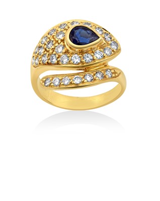 Lot 2283 - A Sapphire and Diamond Snake Ring the snake...