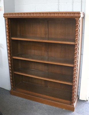 Lot 1117 - An Oak Open Bookcase, with acanthus carved...