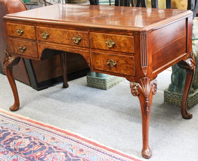 Lot 1285 - A Figured Walnut Desk, early 20th century,...