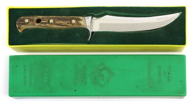 Lot 239 - A Puma Skinner Knife, with 13cm up-turned...