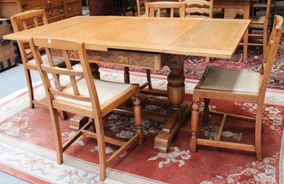 Lot 1200 - An Oak Dining Room Suite, circa 1940s...