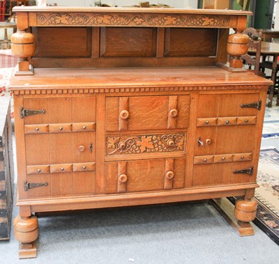 Lot 1200 - An Oak Dining Room Suite, circa 1940s...