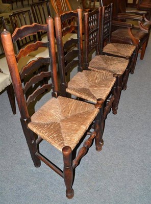 Lot 528 - Four rush seated country dining chairs