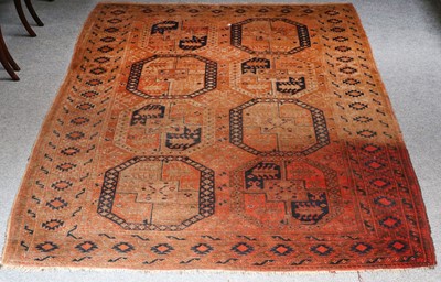 Lot 1106 - An Ersari Carpet, the rust coloured field with...