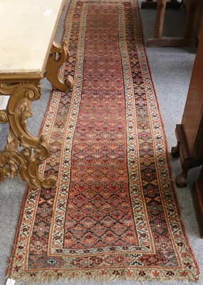 Lot 1096 - A Narrow Bidjar Runner, the terracotta diamond...