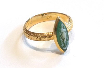 Lot 355 - An 18 Carat Gold Cameo Ring, the green...