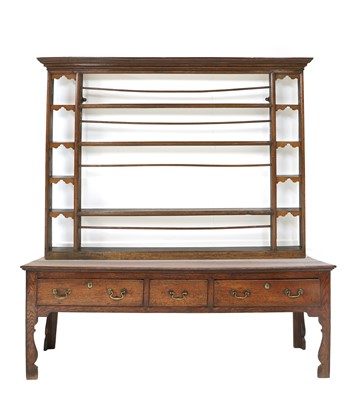 Lot 1236 - A George III Oak Dresser and Rack, the upper...