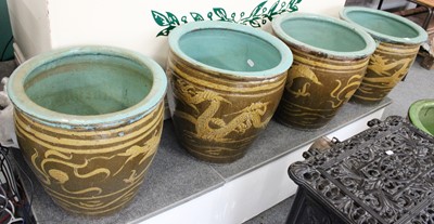 Lot 1298 - A Set of Four Chinese Earthenware Planters,...