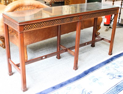 Lot 1321 - A Modern Mahogany Hall Table, with blind fret...