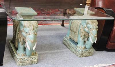 Lot 1288 - A Glass Coffe Table with Pottery Elephant...